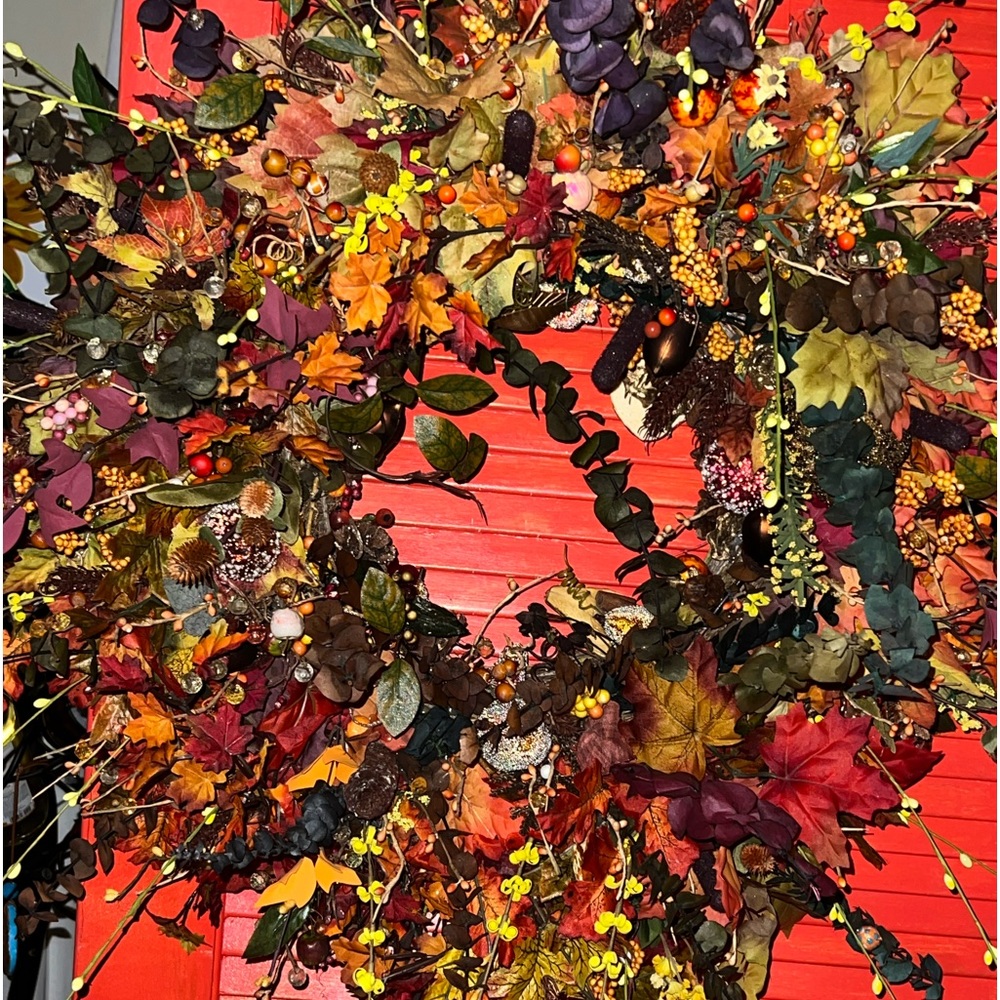 Harvest/fall themed wreath but can be hung year round based on the multicolored